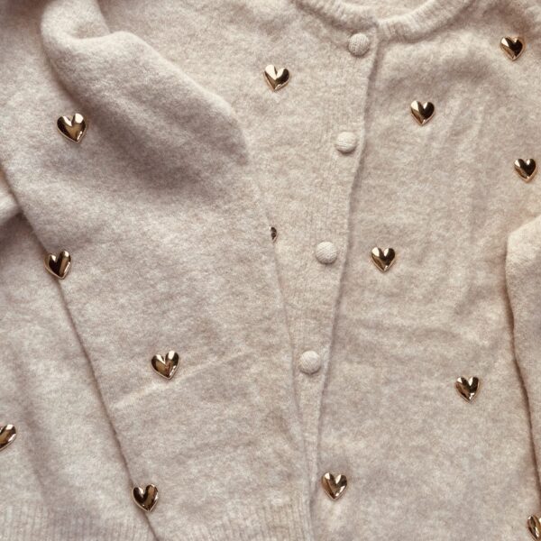 Sweter w serduszka 989